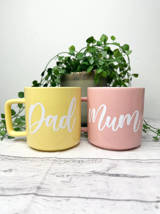 Mum and Dad Pink and Yellow Mugs With white writing Mug set 320ml